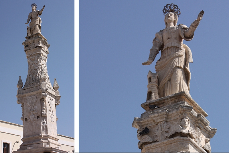 Torre S. Susanna. Statua di Santa Susanna posta sulla colonna al centro della piazza